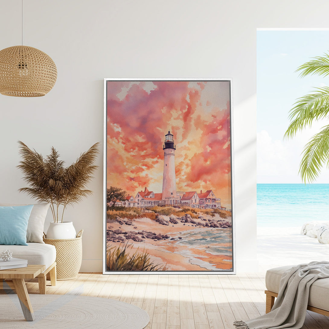 Framed Wall Art: Watercolor lighthouse art with warm sunset hues. Coastal decor for a serene living room. Enhance your space with this beautiful canvas print.