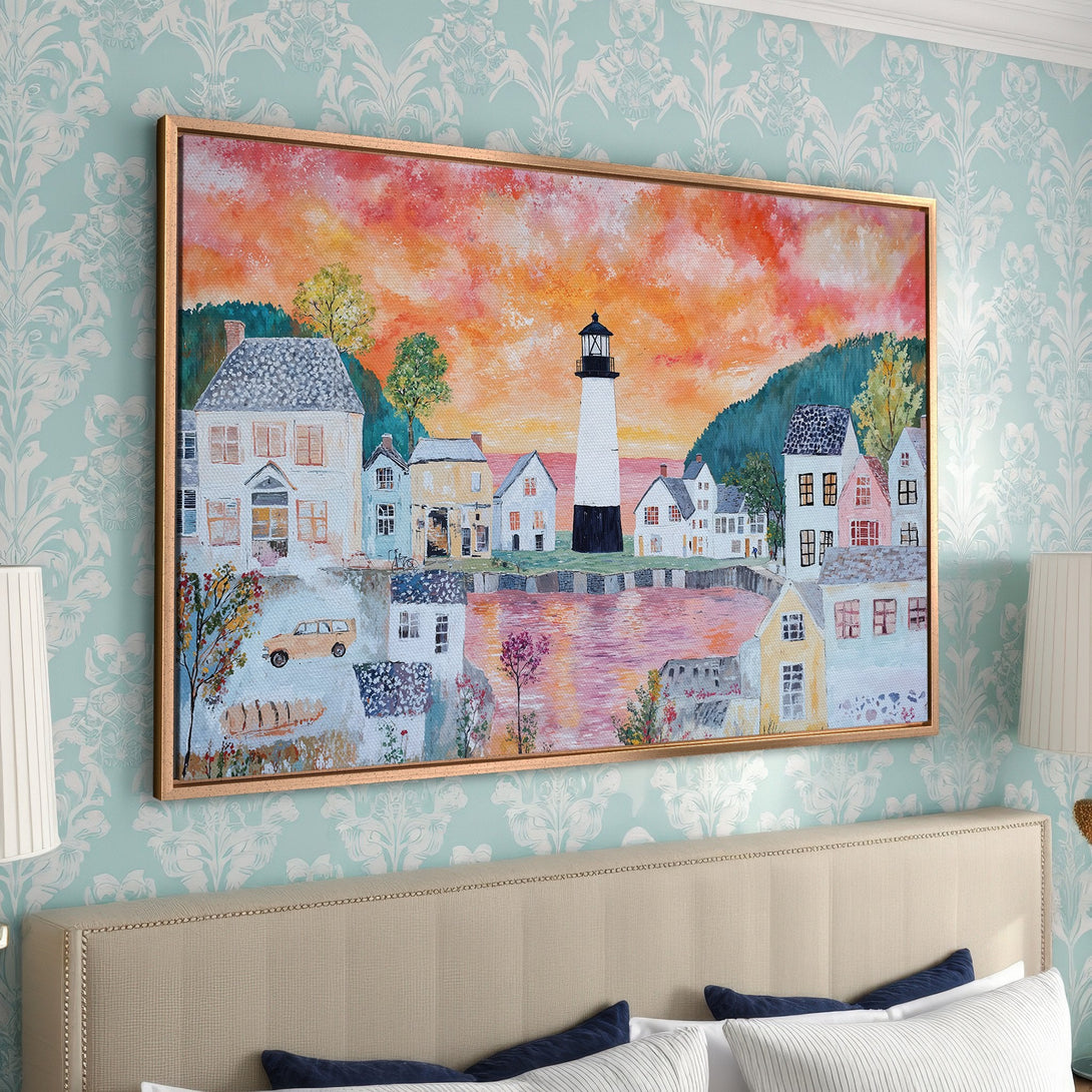 Framed Wall Art of a coastal town scene with a lighthouse. Warm sunset colors and impressionistic style. Perfect for adding charm to any room.