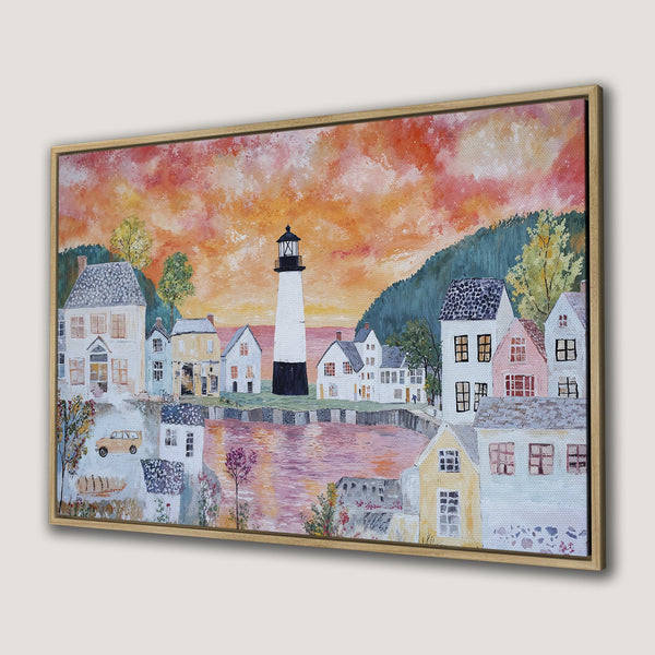 Canvas Print of a coastal town scene with lighthouse, warm sunset colors, and charming houses. Perfect framed wall art for a cozy interior.