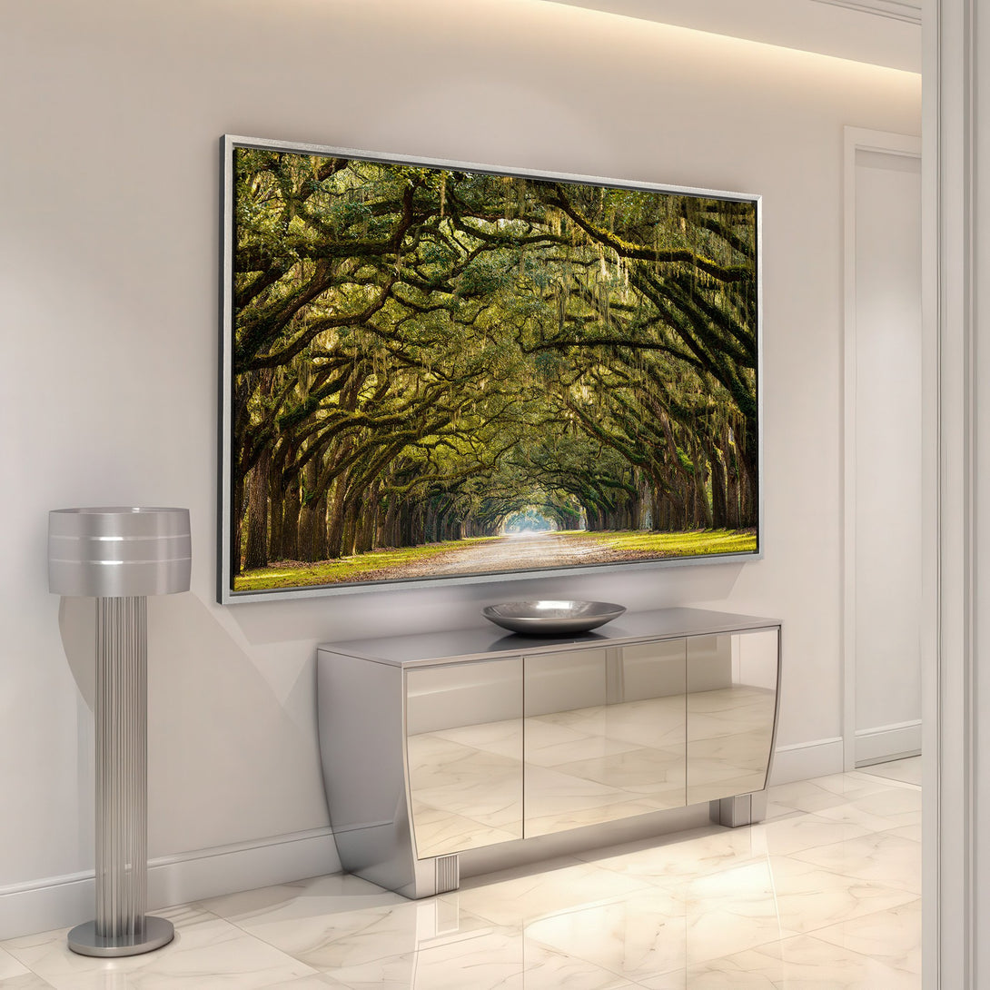 Framed Wall Art: Scenic tree-lined road in green and gold tones. Elegant canvas print adds a touch of nature to any interior.