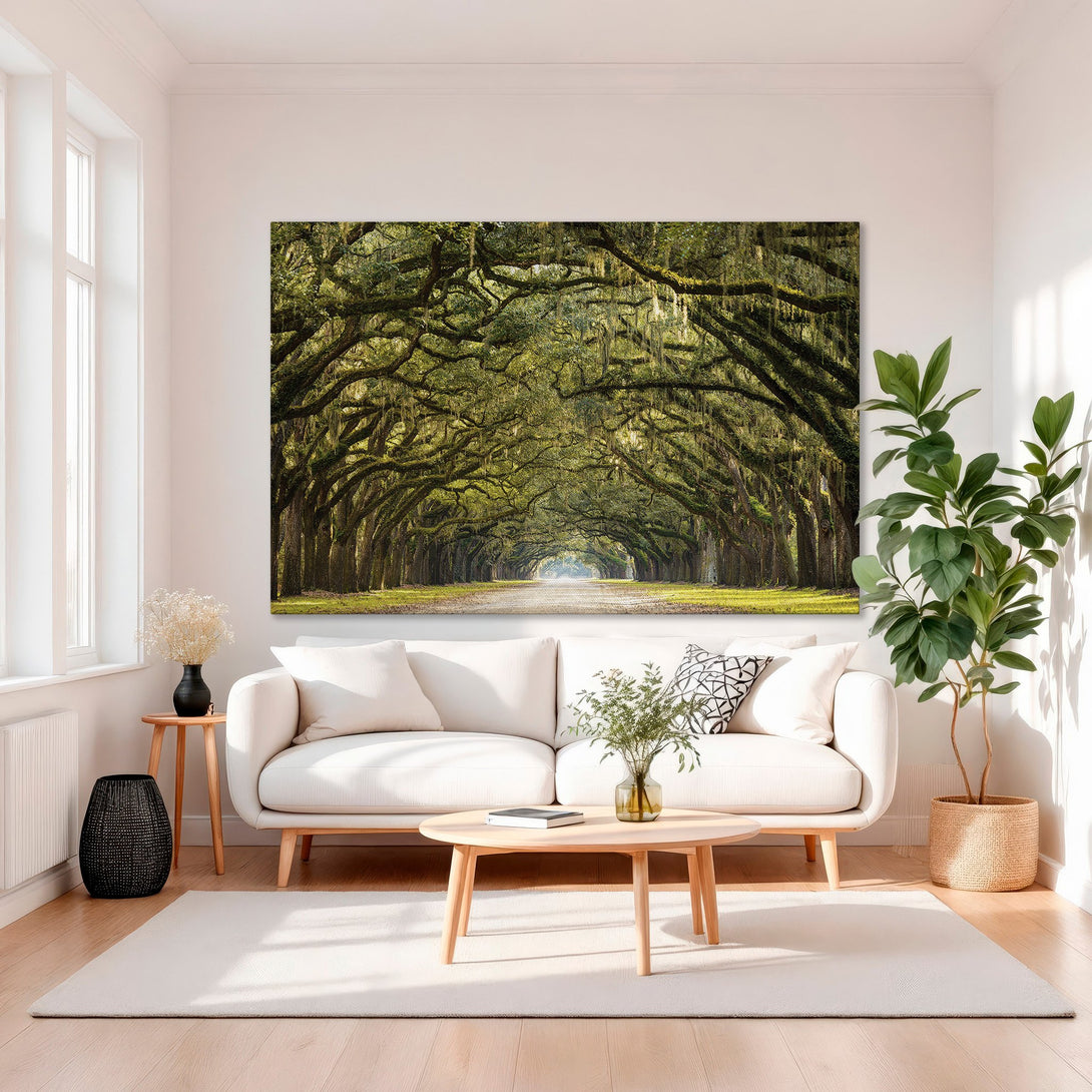 Framed Wall Art: Scenic tree-lined road canvas print in green & gold. Elegant interior decor with a classic, nature-inspired aesthetic.