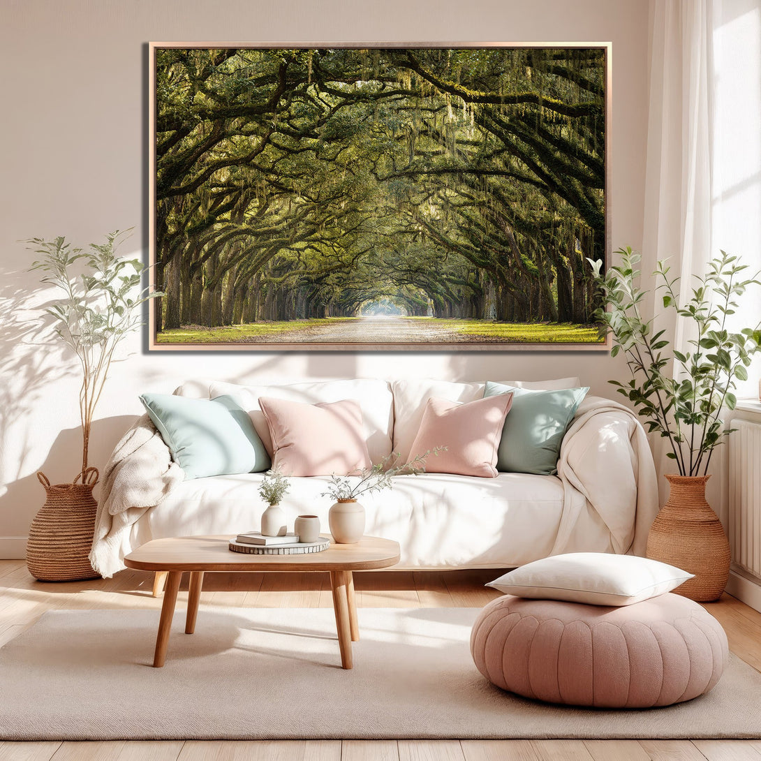 Framed Wall Art: Scenic road through lush trees. Green and gold landscape art adds a touch of nature to your home. Warm, inviting color palette.