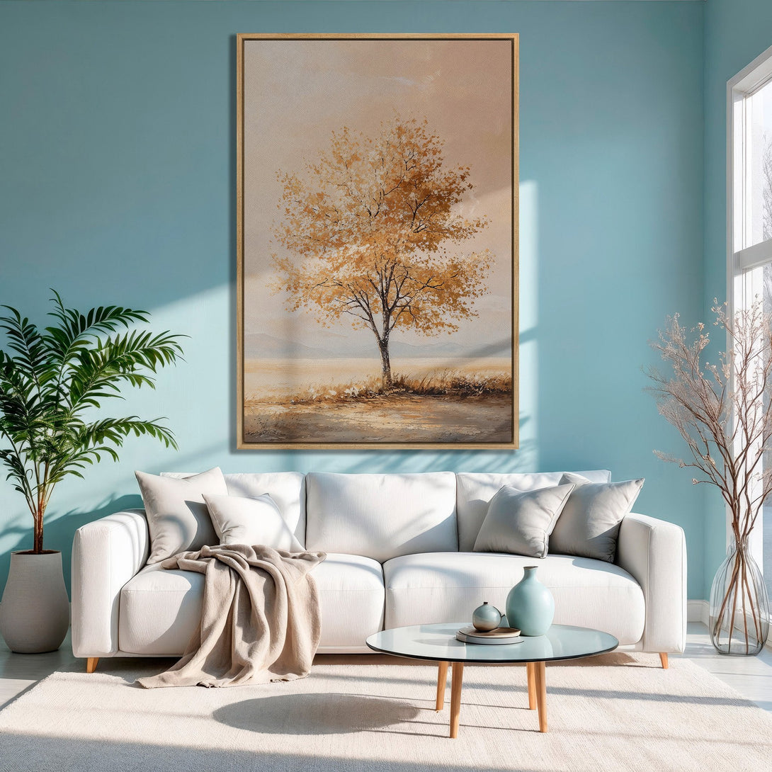 Framed Wall Art featuring a golden tree landscape in a modern living room. Warm, neutral color palette for a calming aesthetic.