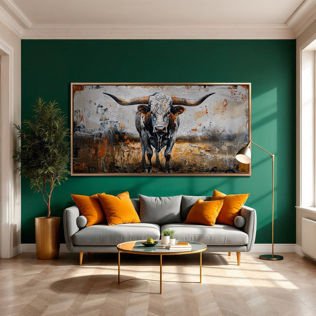Framed Wall Art: Majestic bull painting with a textured, abstract style. Earthy tones of brown, orange, and gray pop against a rich green wall. Elevate your space!