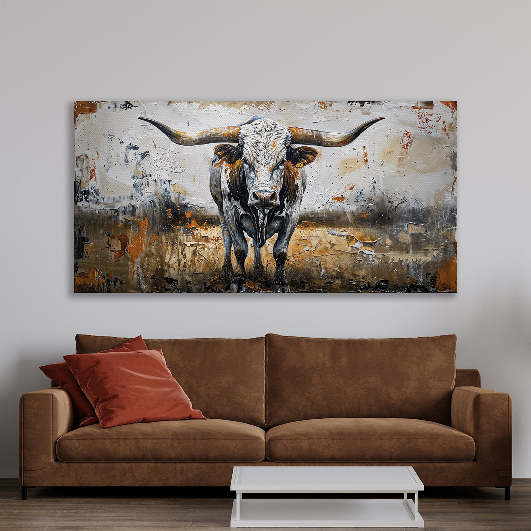 Framed Wall Art: Bold bull painting in a modern, textured style. Earthy color palette of browns, oranges, and whites. Perfect for adding rustic charm to your space.