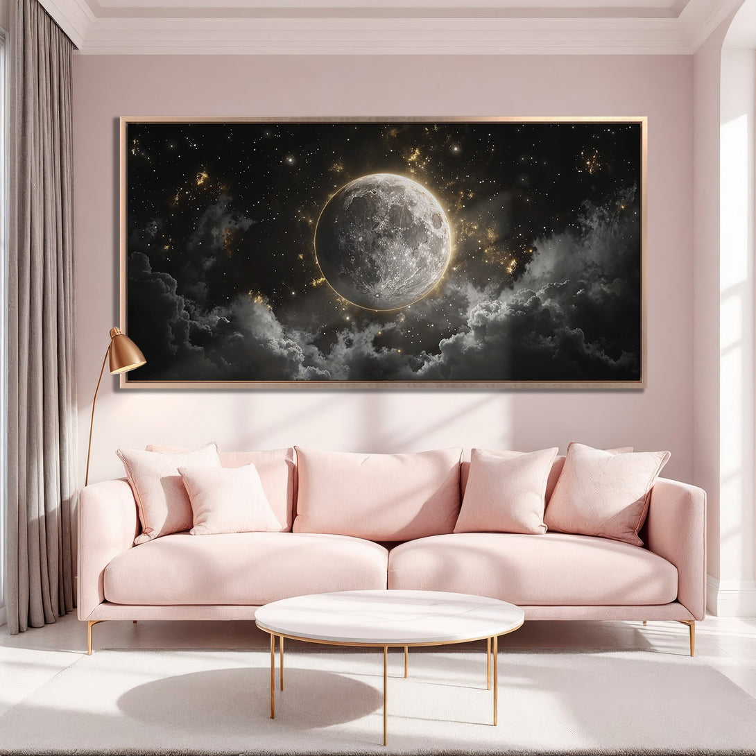 Framed Wall Art: Moonlit night scene canvas print in a modern living room. Dramatic black, gray, and gold palette complements the pink interior. Elevate your space!