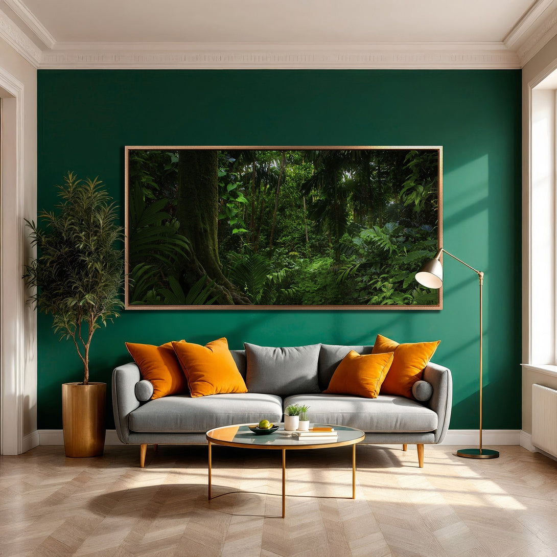 Framed Wall Art depicting a lush green jungle scene, adding a touch of nature to a modern interior with a vibrant green and orange color palette.