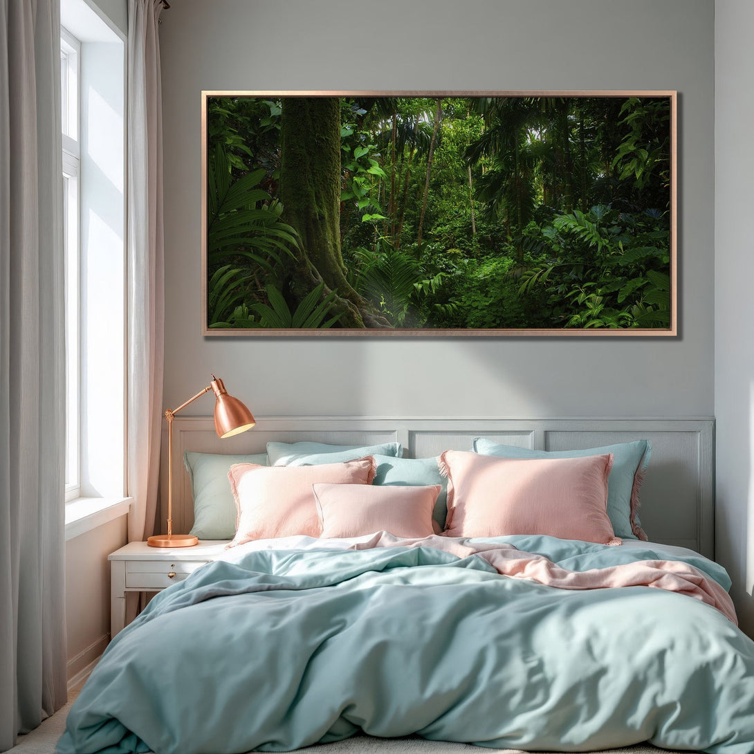 Framed Wall Art of lush green rainforest scene, creating a tranquil bedroom atmosphere. Earthy tones with pops of pink and teal. Bring nature indoors!