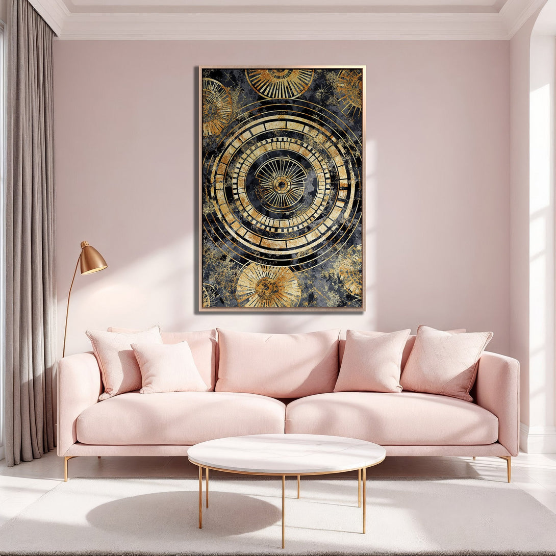 Framed Wall Art featuring a geometric gold and black design, displayed in a modern living room with a blush pink color palette.