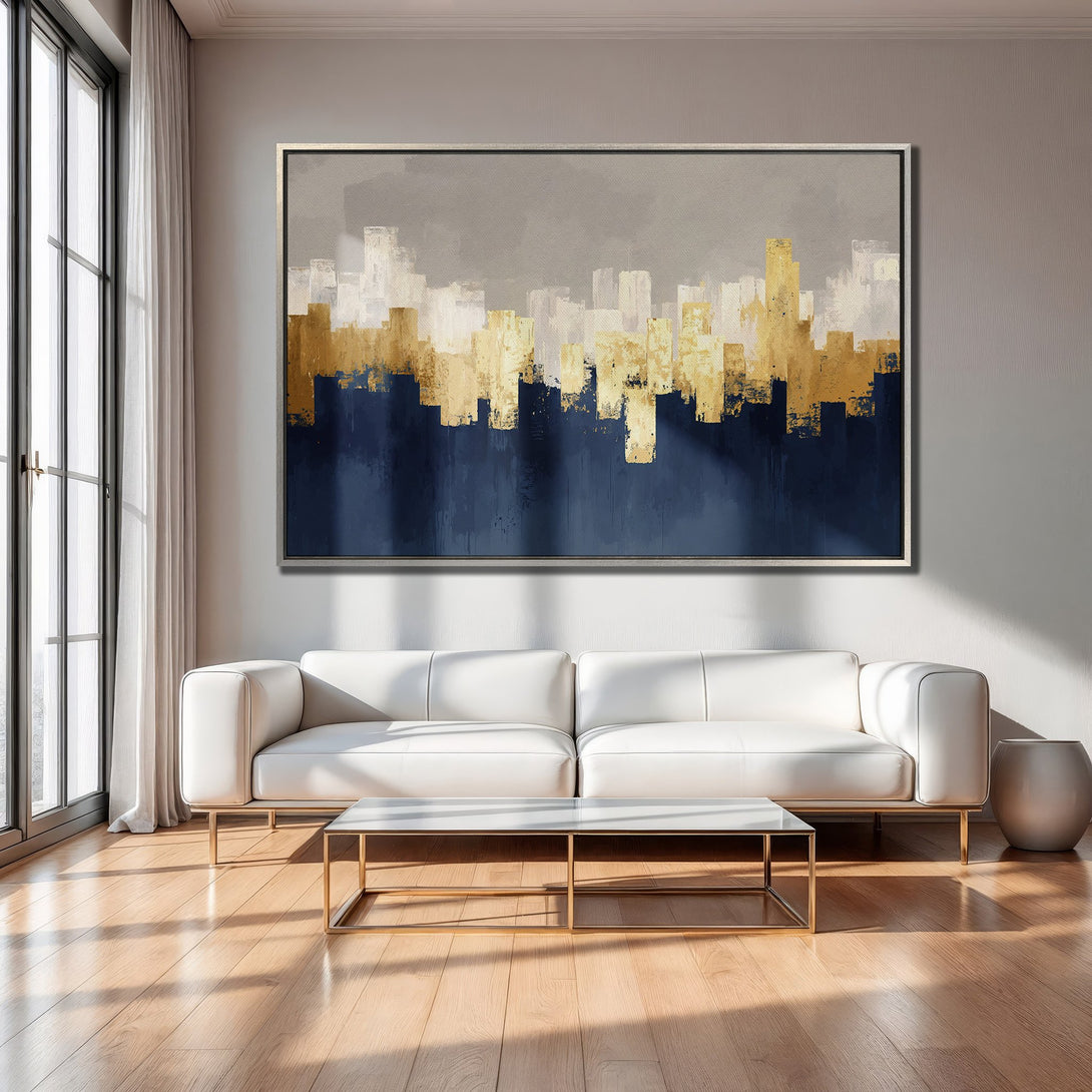 Framed Wall Art of an abstract cityscape in blue, gold, and white. Modern art for a stylish living room.