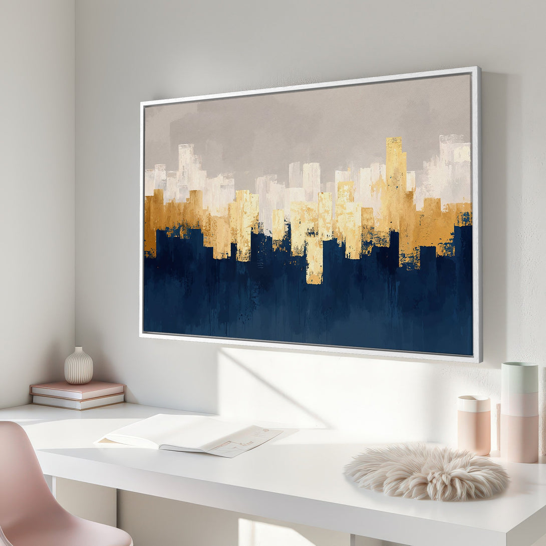 Framed Wall Art featuring an abstract cityscape in gold, navy, and neutral tones. Modern art for a stylish interior.