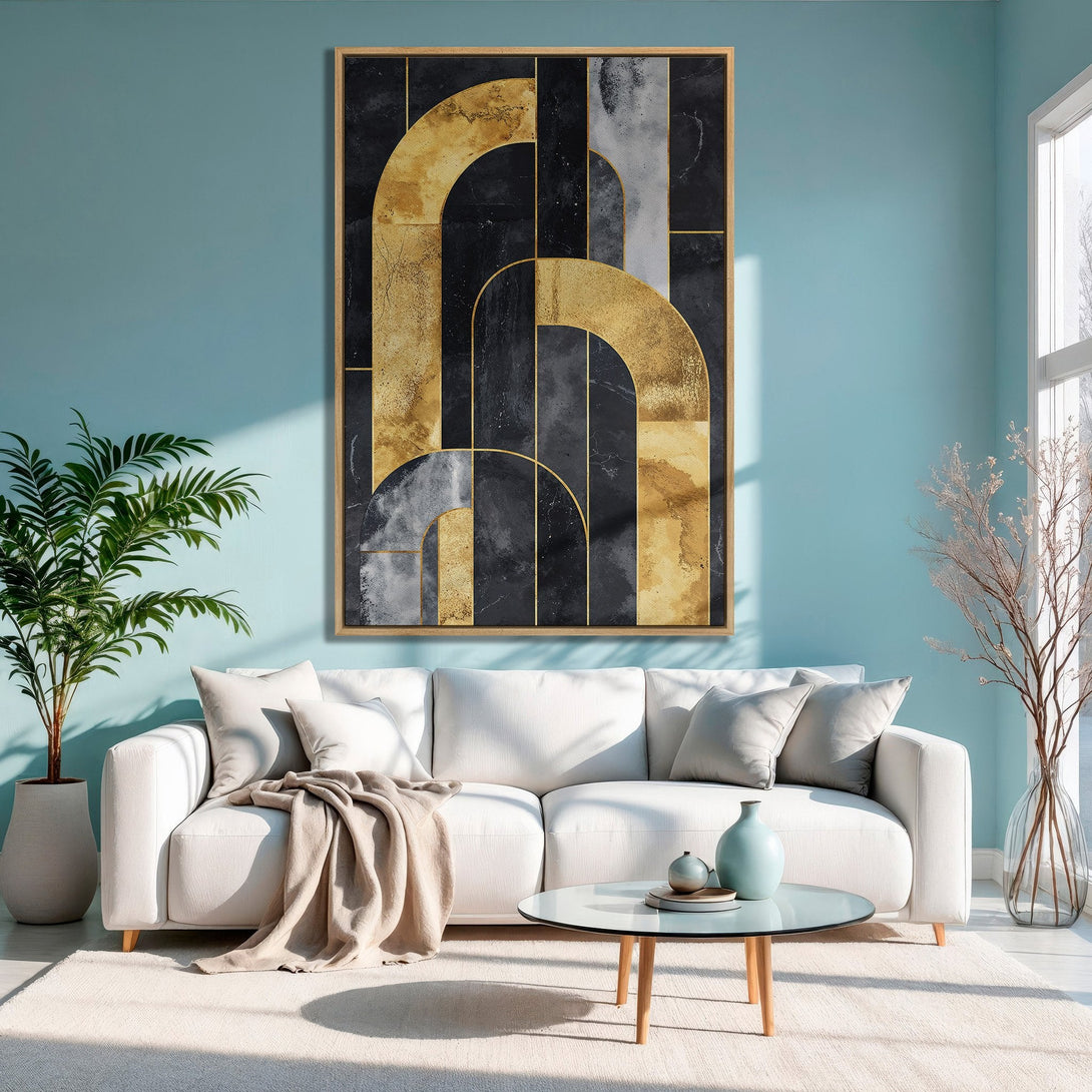 Framed Wall Art featuring abstract geometric design in gold, black, and gray. Modern canvas print adds a touch of elegance to any living room.