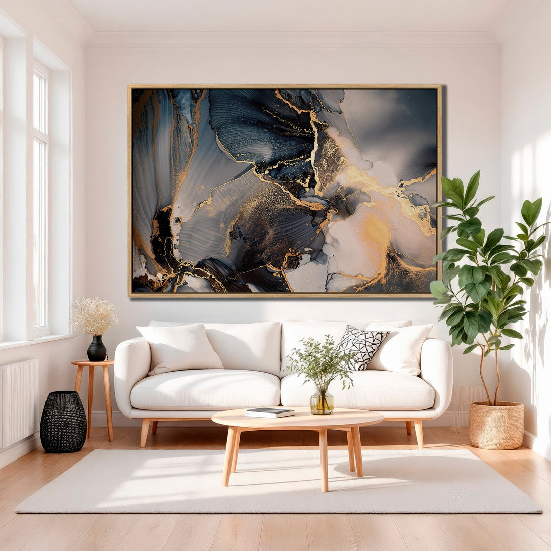 Framed Wall Art featuring an abstract gold, blue, and grey design. Modern canvas print for living room decor.