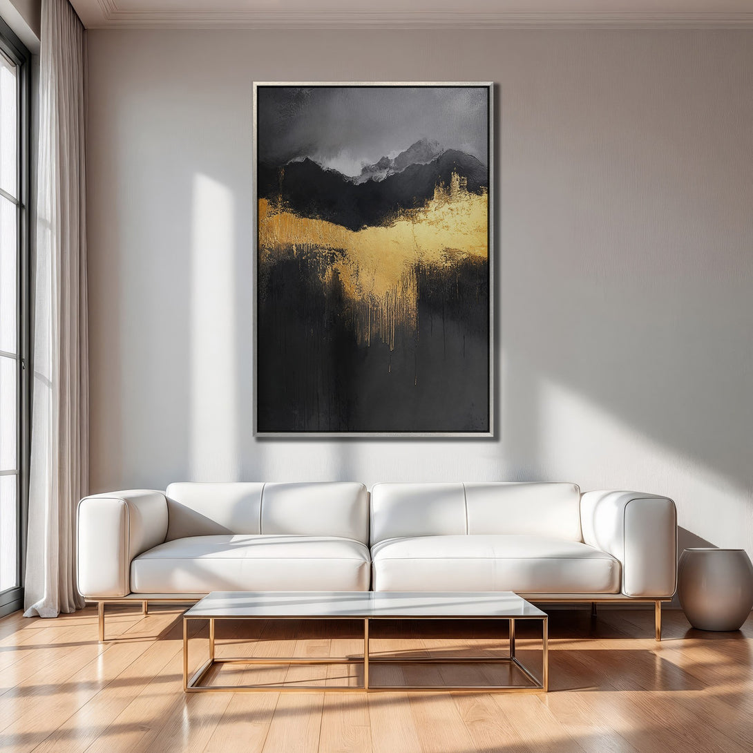 Framed Wall Art: Abstract gold and black painting adds modern elegance to a living room. Dramatic color palette for stylish home decor.