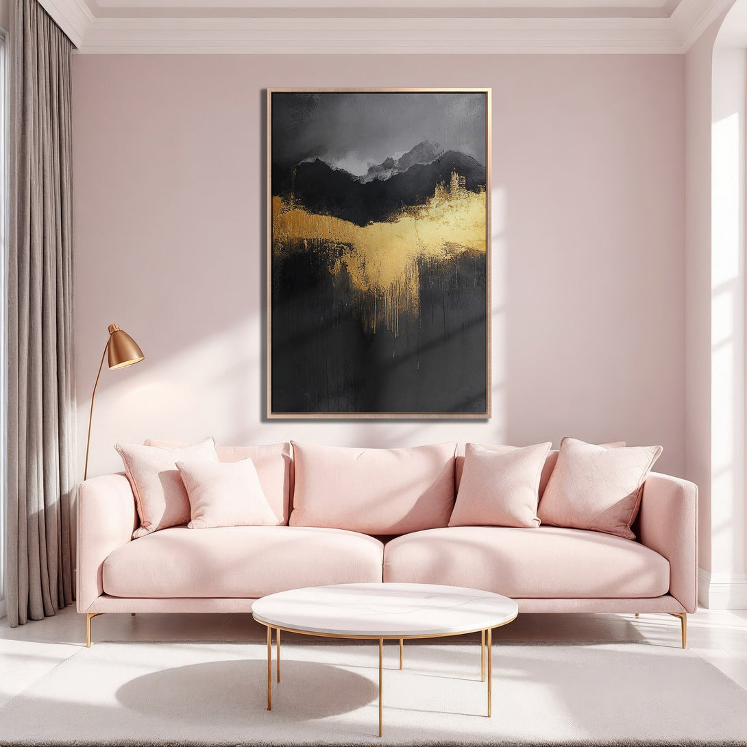 Framed Wall Art featuring an abstract gold and black painting. Modern art style with a luxurious aesthetic, displayed in a blush pink interior.