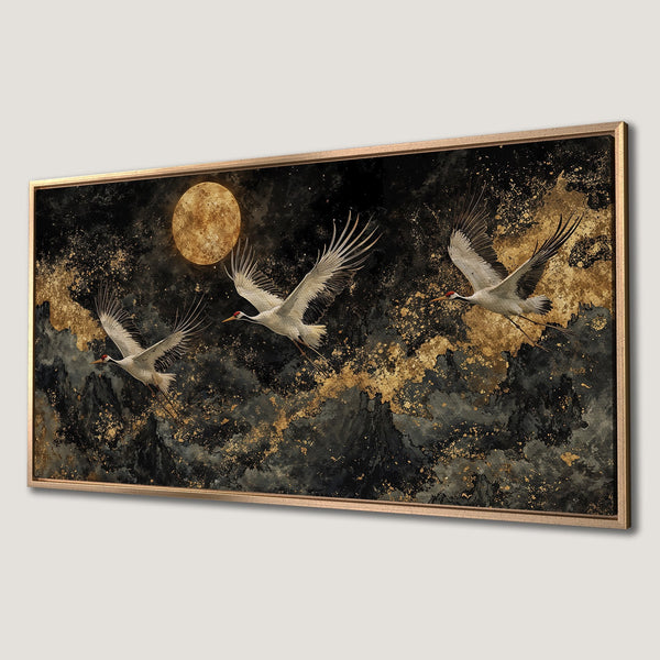 Framed Wall Art featuring cranes in flight over a dramatic landscape. Black, gold, and white color palette. Perfect for adding a touch of elegance.