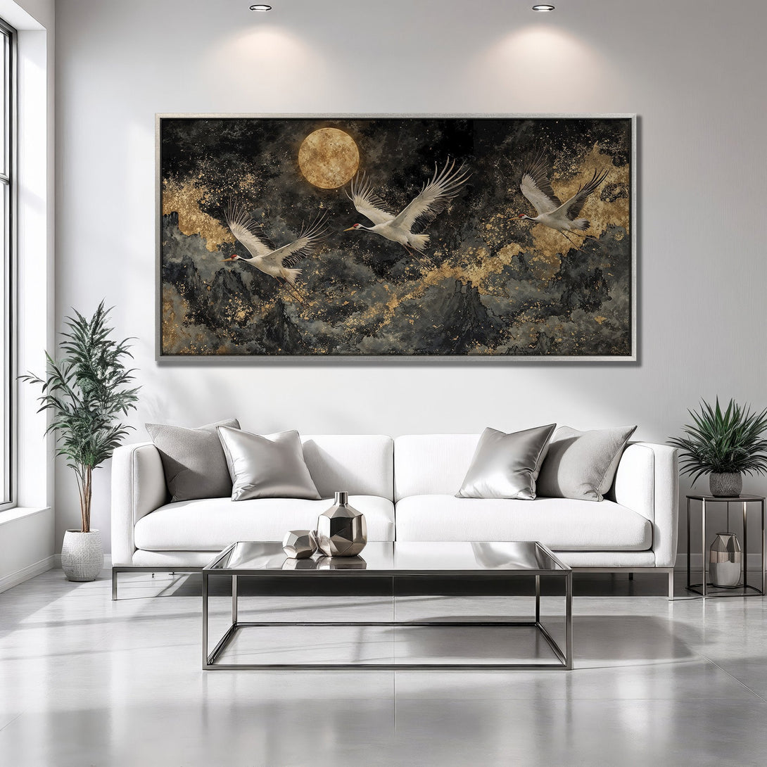 Framed Wall Art featuring cranes in flight, a stunning black, gold, and white color palette. Modern art for living room decor.