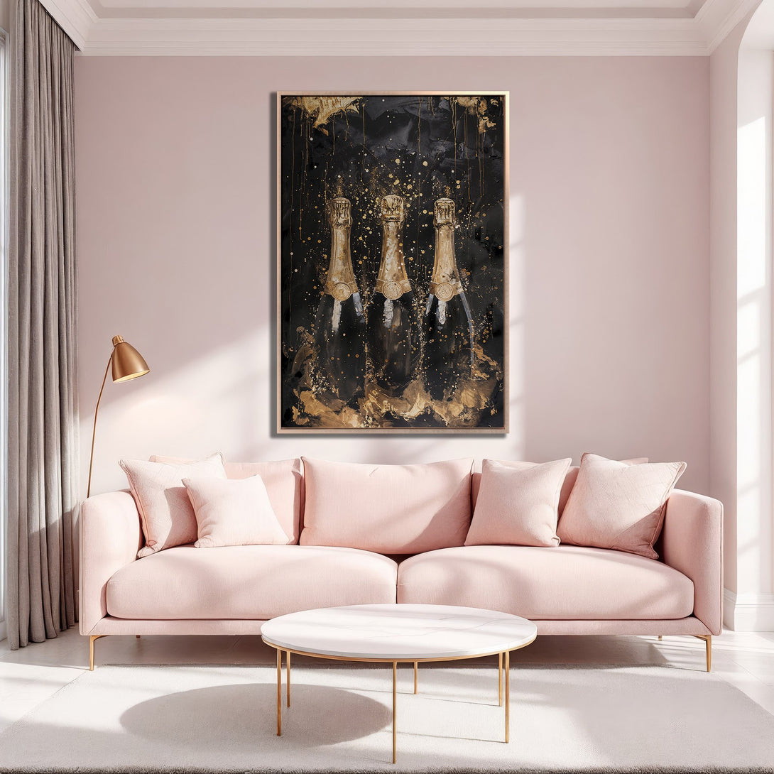 Framed Wall Art of champagne bottles in gold and black, displayed in a stylish pink and gold interior. Elevate your space with this luxurious canvas print!