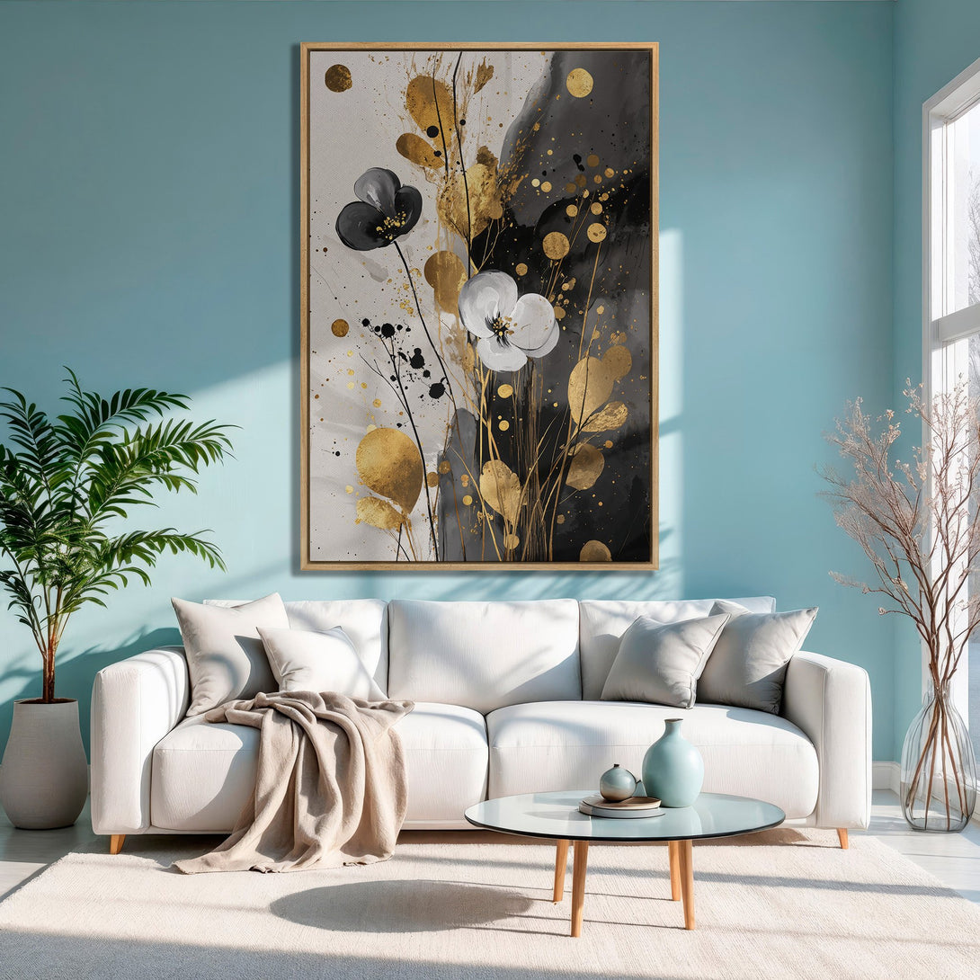 Framed Wall Art: Abstract floral Canvas Print in black, white, and gold. Modern art piece adds elegance to any interior with a neutral color palette.