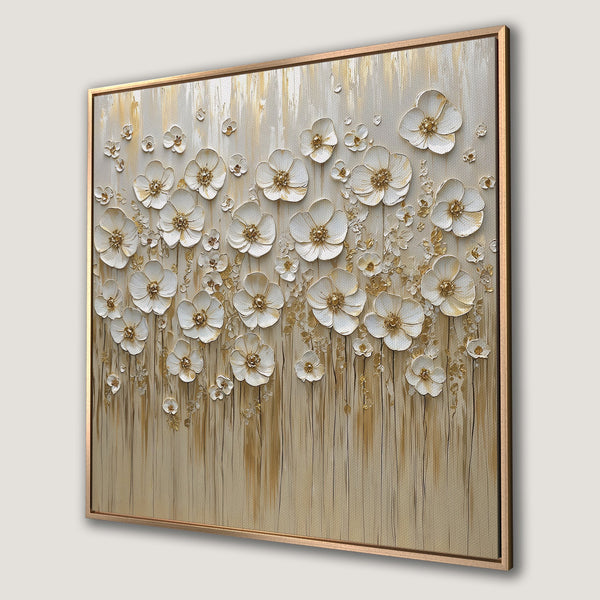 Framed Wall Art: Elegant floral canvas print, featuring white textured flowers with gold accents on a neutral beige background. Perfect for modern decor.