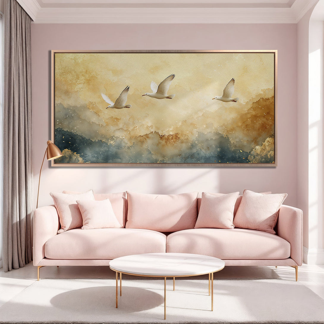 Framed Wall Art featuring watercolor seagulls in flight. Warm gold, blue, and neutral tones. Perfect for adding a touch of elegance to your living room.