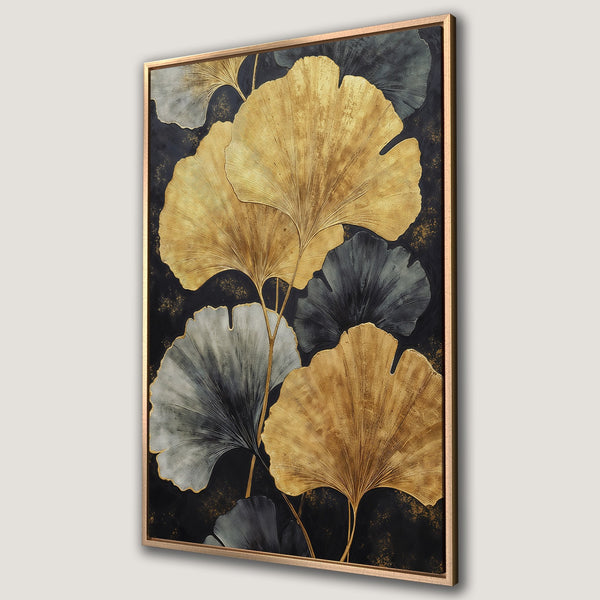 Framed Wall Art featuring gold and grey ginkgo leaves on a black background. Modern botanical art with a luxurious, elegant feel.