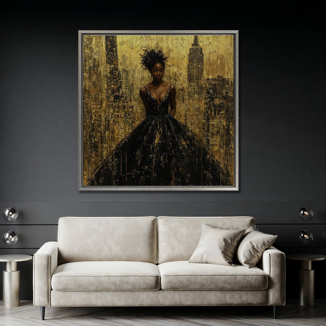 Framed Wall Art featuring a woman in a black dress against a gold cityscape. Modern abstract style with a luxurious black and gold color palette. Perfect for home decor.