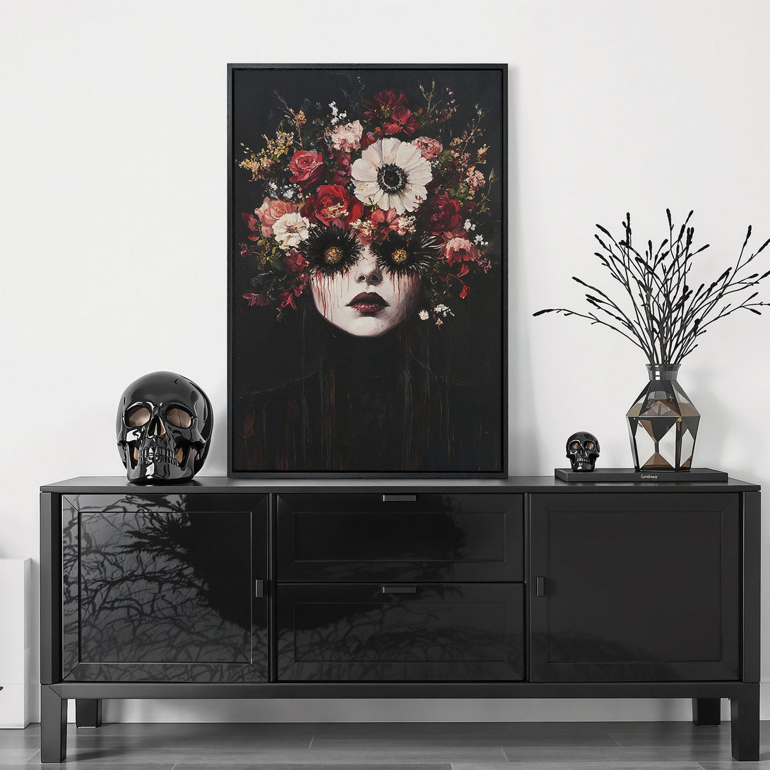 Framed Wall Art: Gothic portrait Canvas Print with a floral crown, moody color palette of reds, blacks, and whites. Elevate your home decor with this stunning piece!