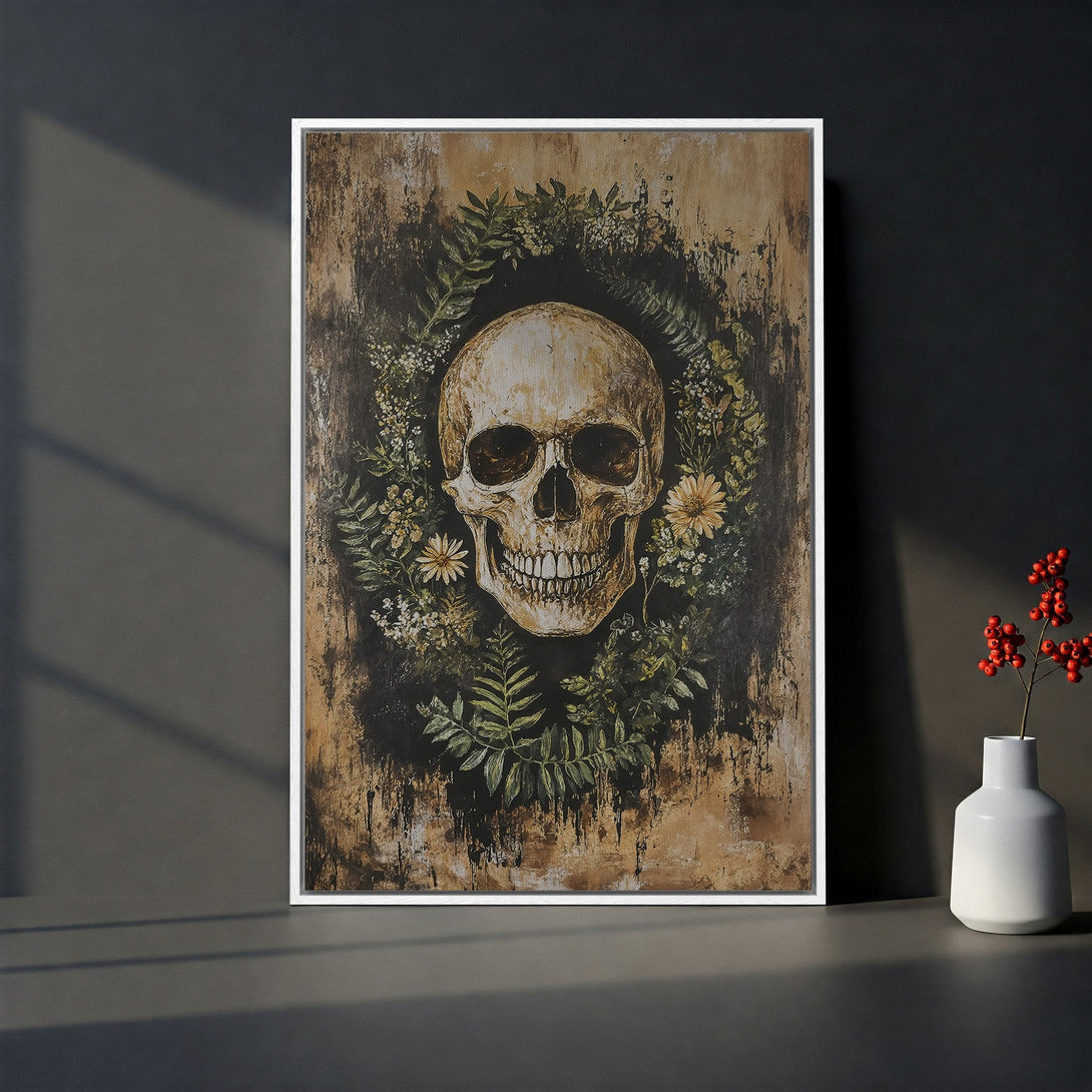 Framed Wall Art featuring a skull and floral wreath. Dark, moody color palette with brown, green, and cream tones. Perfect gothic home decor.