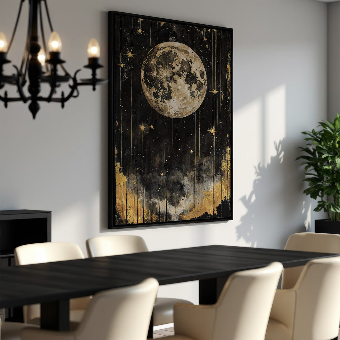 Framed Wall Art featuring a celestial moon and stars in a black and gold color palette. Perfect for adding a touch of cosmic elegance to your dining room.