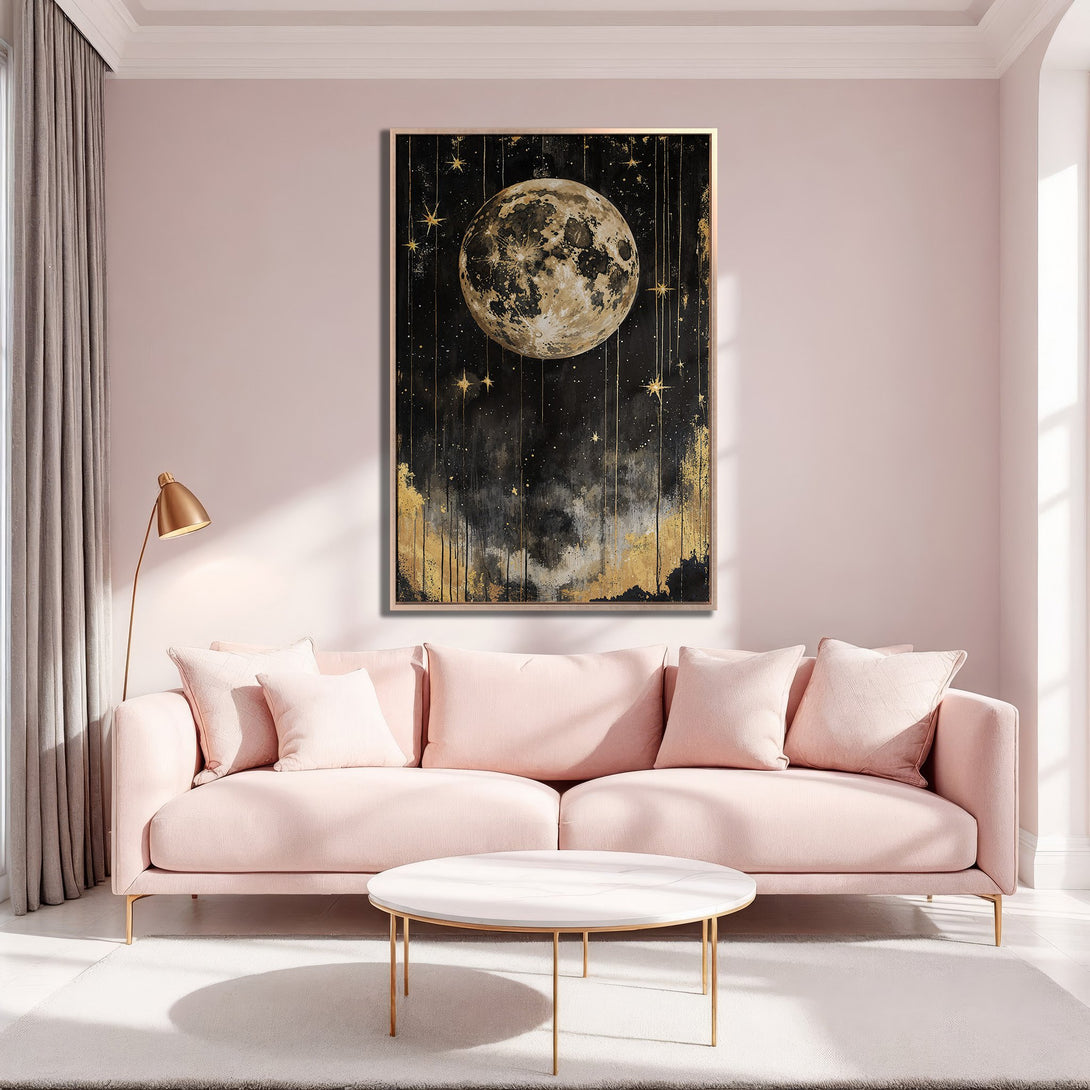 Framed Wall Art: Celestial moon and stars canvas print in a modern interior. Black, gold, and blush pink color palette. Perfect for adding a touch of elegance.