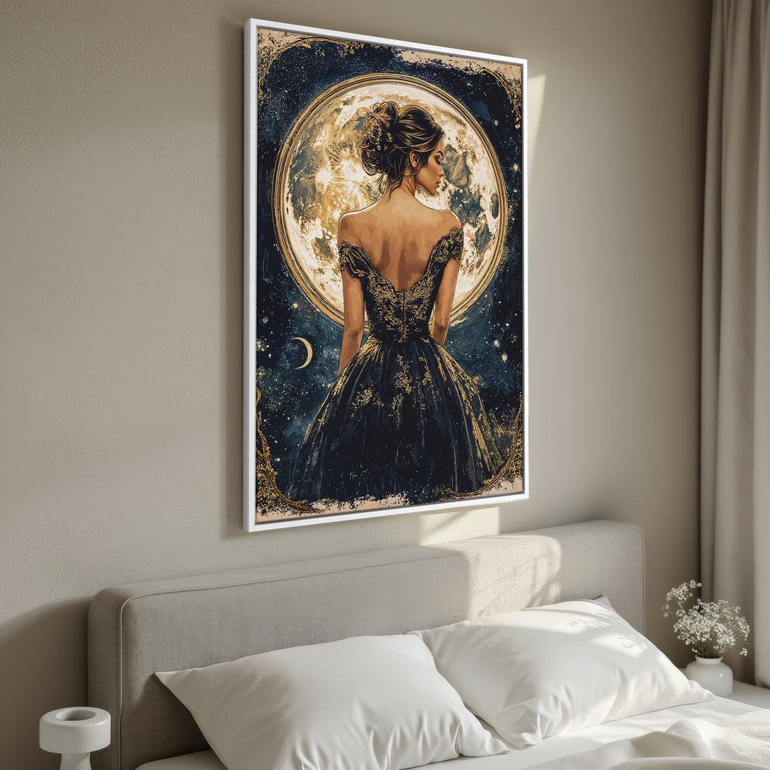 Framed Wall Art featuring a woman in a gown against a moonlit sky. Elegant, artistic style with a dark blue, gold, and neutral color palette. Perfect bedroom decor.