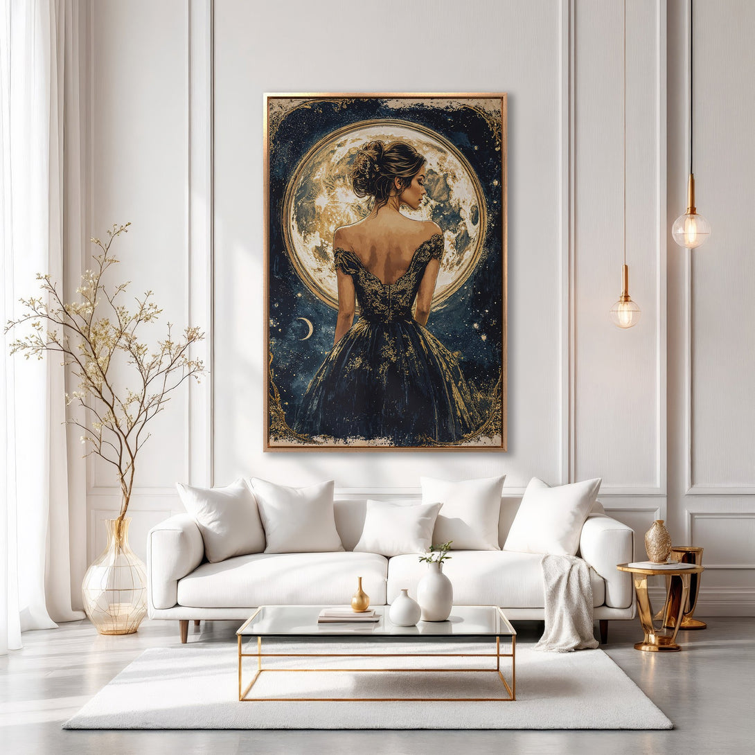 Framed Wall Art featuring a woman in a dark dress against a moon backdrop, in a sophisticated, celestial style with gold and navy tones.