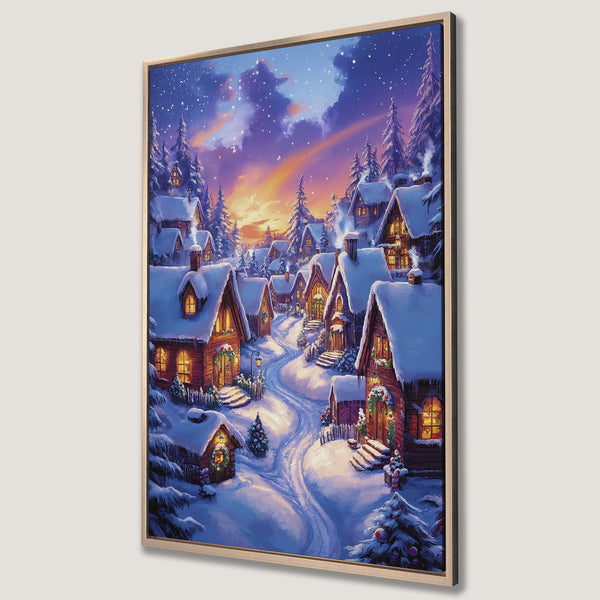 Framed Wall Art featuring a charming winter village scene with snow-covered houses, warm lighting, and a blue/purple/orange color palette. Perfect holiday decor.