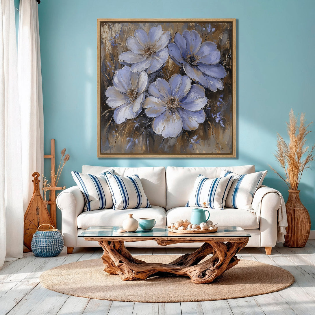 Framed Wall Art: Floral painting in a coastal living room. Featuring large blue flowers with a neutral color palette. Perfect for adding a touch of elegance.