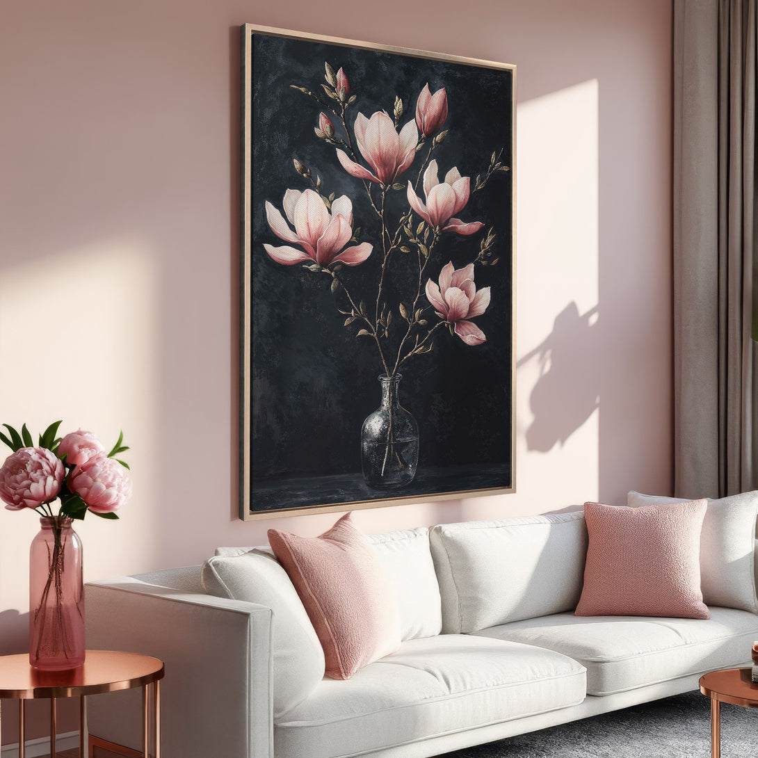 Framed Wall Art: Elegant magnolia flower canvas print in a modern interior. Features a dark background with pink & gold accents. Perfect home decor.