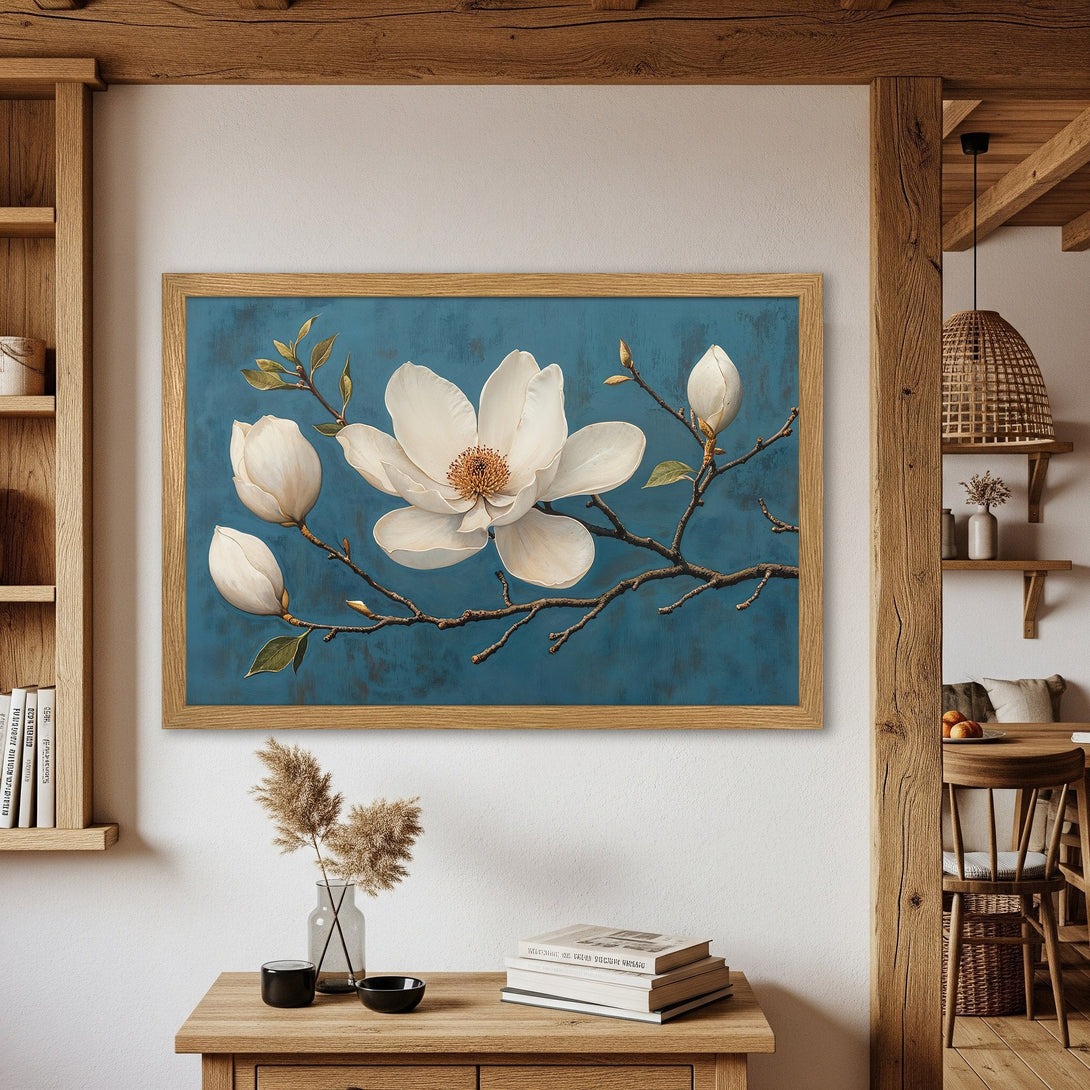 Framed Poster featuring a magnolia flower painting in a serene, blue and white color palette. Perfect wall art for a calming space.