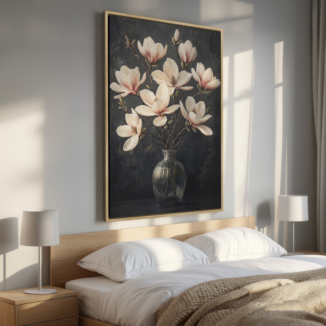 Framed Wall Art featuring a floral still life in a bedroom. Elegant magnolia blossoms in a dark, moody color palette. Perfect bedroom decor.