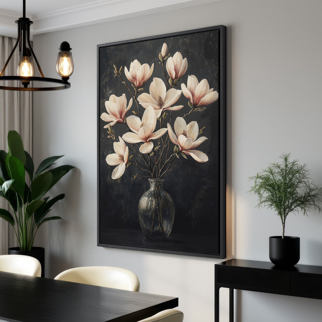 Framed Wall Art featuring elegant magnolia flowers in a vase. Dark and moody color palette with cream and black tones. Perfect for modern home decor.