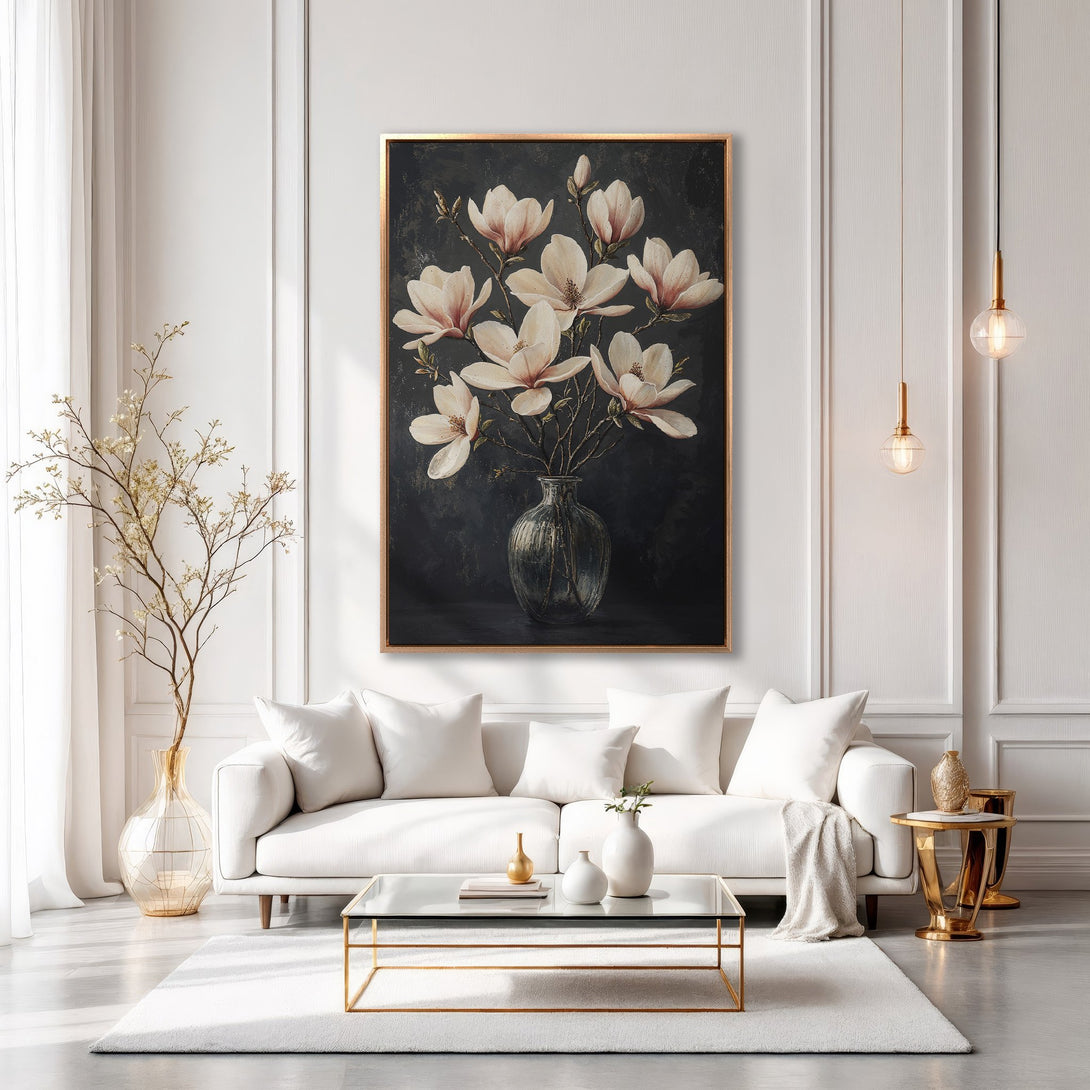 Framed Wall Art featuring elegant magnolia flowers. Dark, moody painting with gold frame, perfect for adding a touch of sophistication to your home decor.
