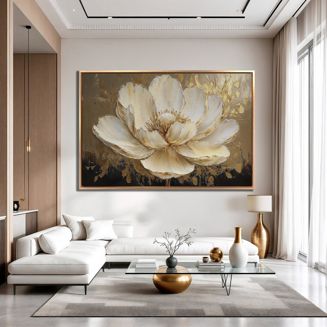 Framed Wall Art of a large, textured white flower with gold accents. Modern style, neutral color palette, perfect for living room decor.