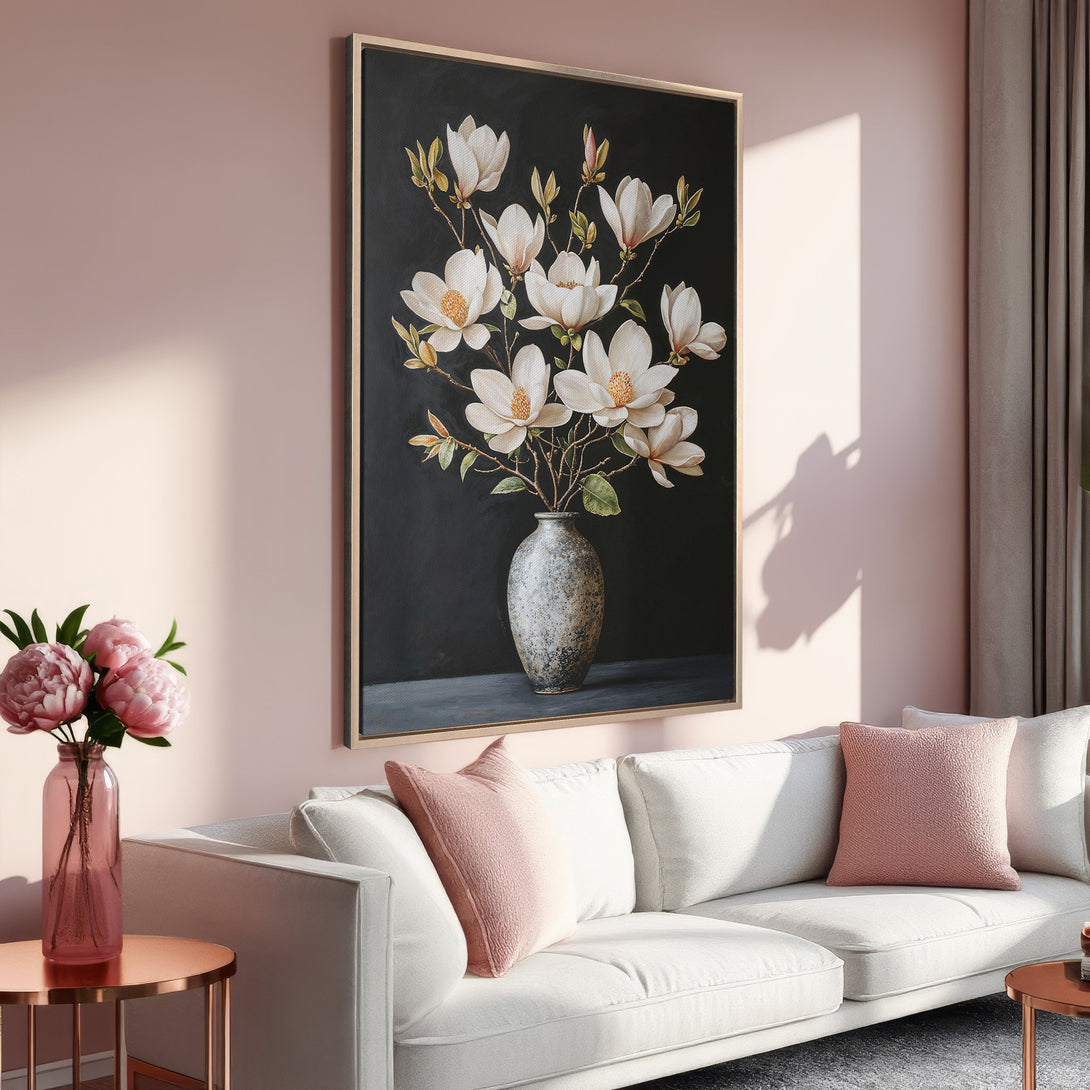 Framed Wall Art Canvas Print featuring elegant white magnolia flowers on a dark background. Soft pink and neutral color palette, perfect for home decor.