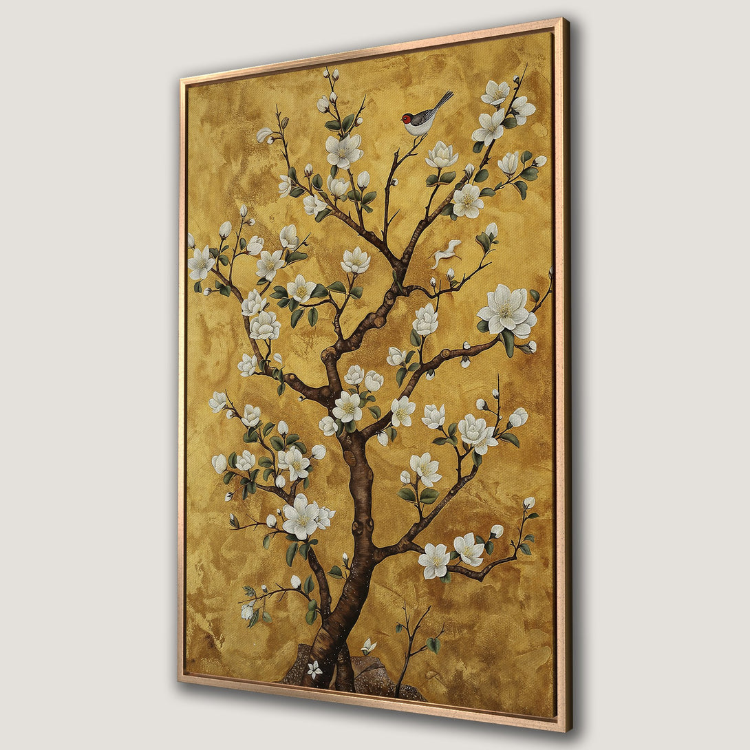 Framed Wall Art featuring a blossoming tree with a bird, in a gold and white color palette. Elegant and serene decor for your home.