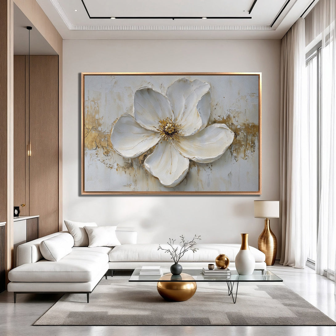 Framed Wall Art: Elegant white flower painting in a modern interior. Neutral color palette with gold accents. Perfect for living room decor.