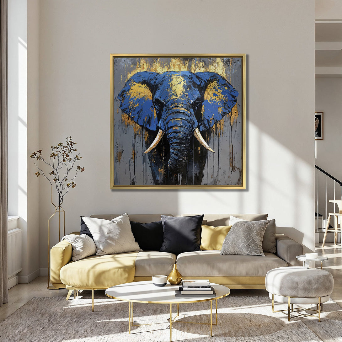 Canvas Print: Abstract elephant art in blue and gold, displayed in a modern interior with red chairs. Bold color palette for stylish wall decor.