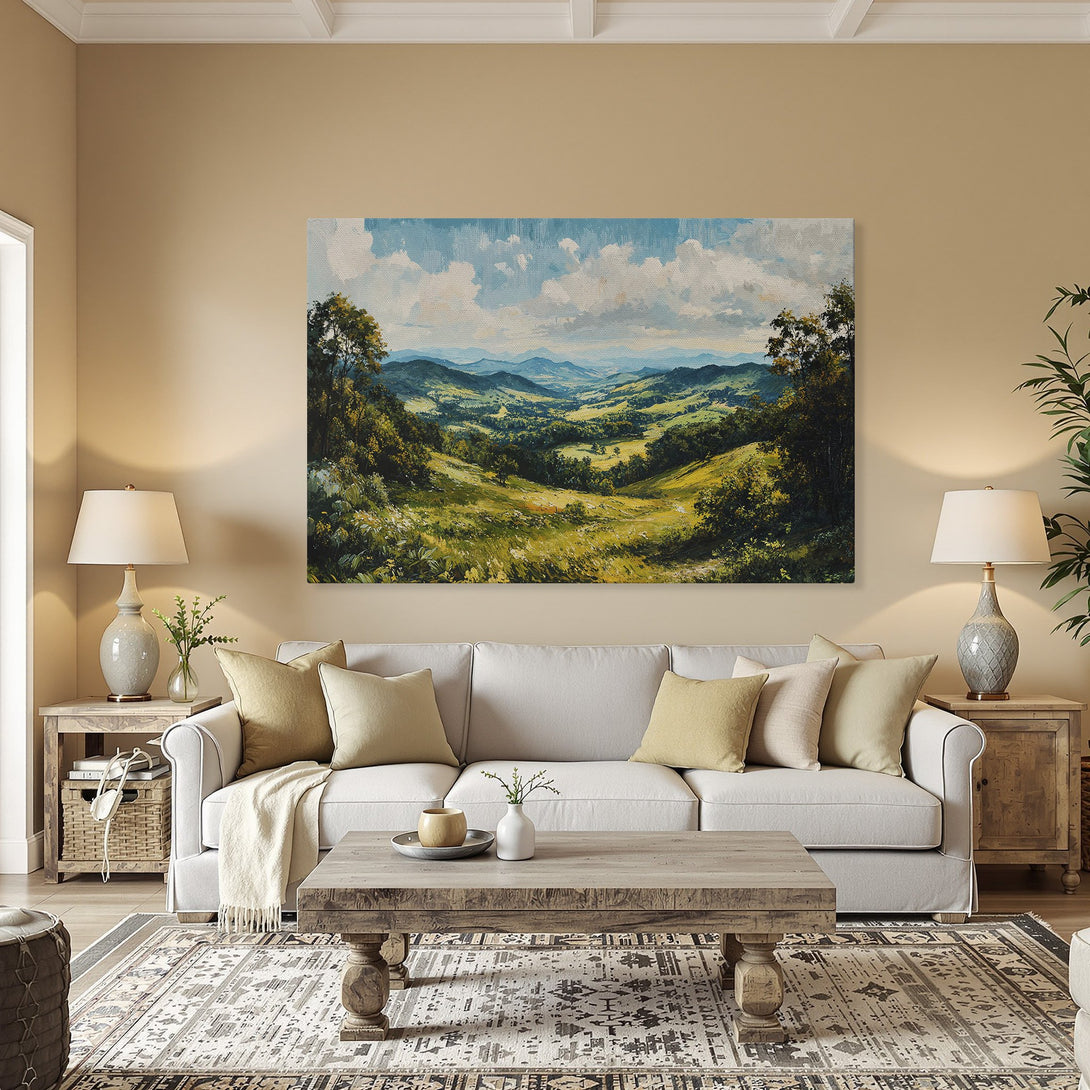 Framed Wall Art: Landscape Canvas Print in a warm interior. Features a serene valley scene with blues, greens, and yellows. Perfect for home decor.