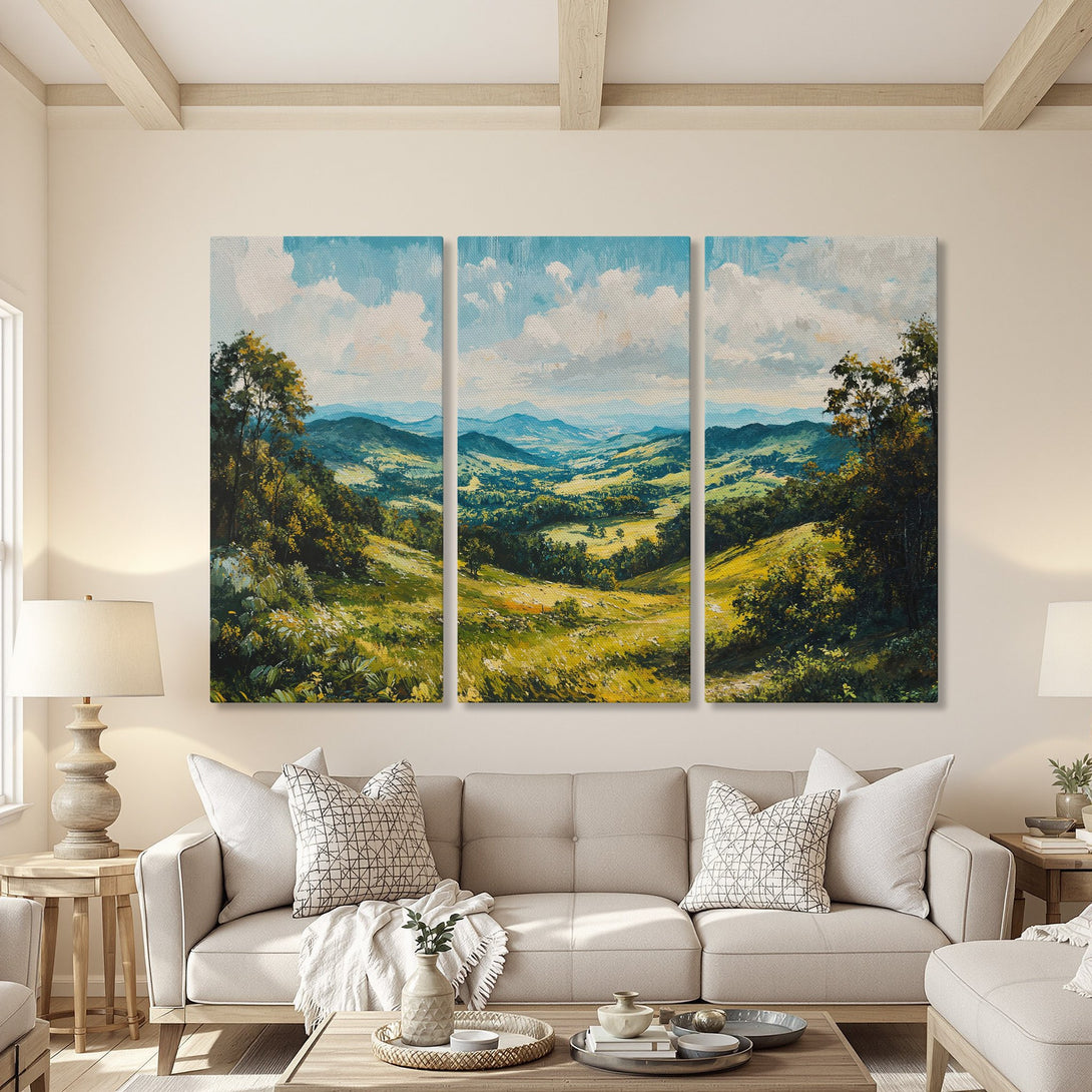 Canvas Print of a scenic landscape painting in a living room. Features rolling hills, blue skies, and a green/yellow color palette.