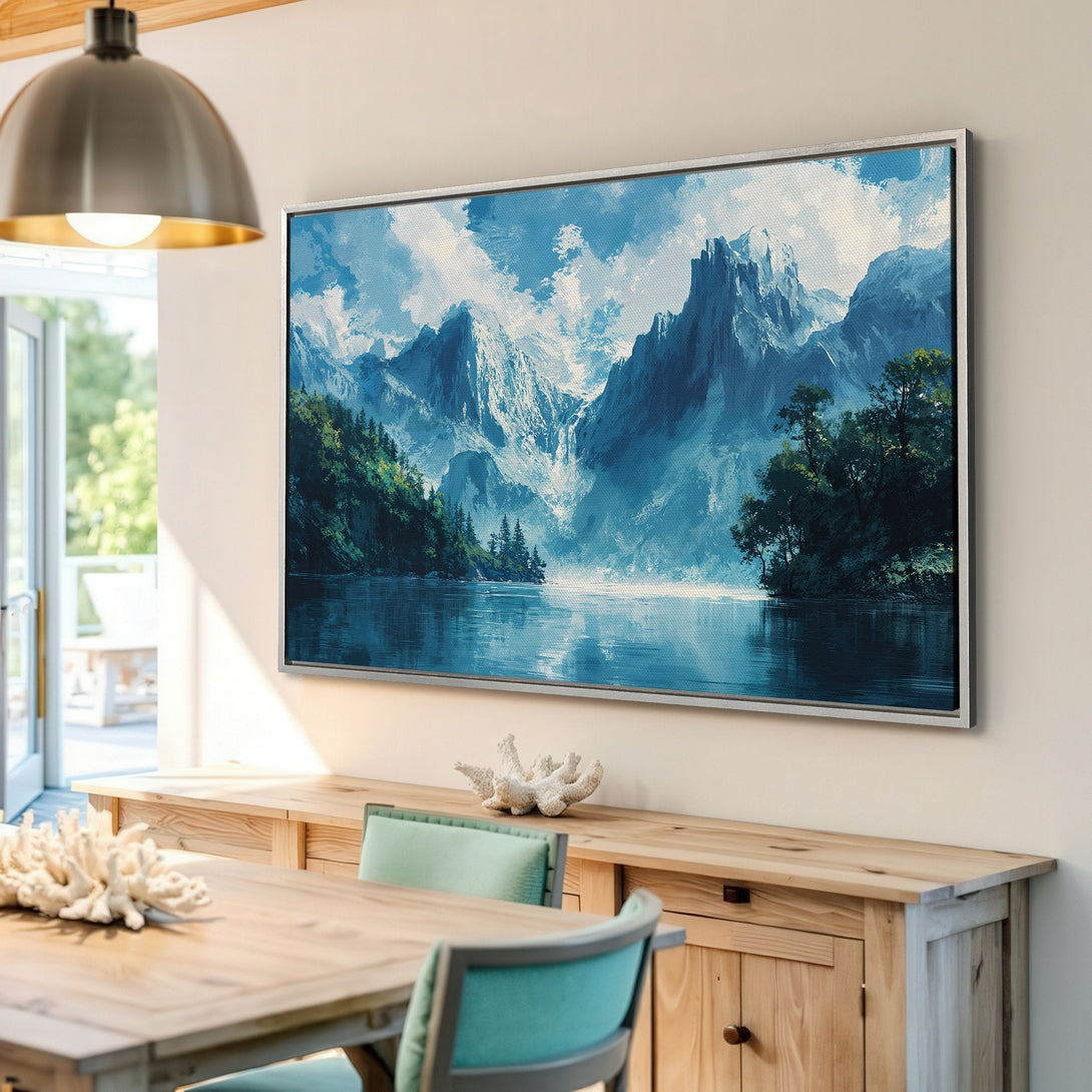 Framed Wall Art: Mountain landscape canvas print in cool blue tones. Perfect for adding a touch of nature-inspired art to your home decor.