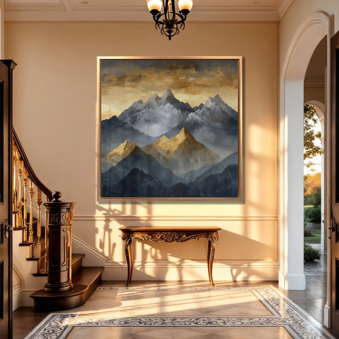 Framed Wall Art: Majestic mountain landscape canvas print in a warm, neutral interior. Earthy tones of gold, blue, and gray create a serene, inviting atmosphere.