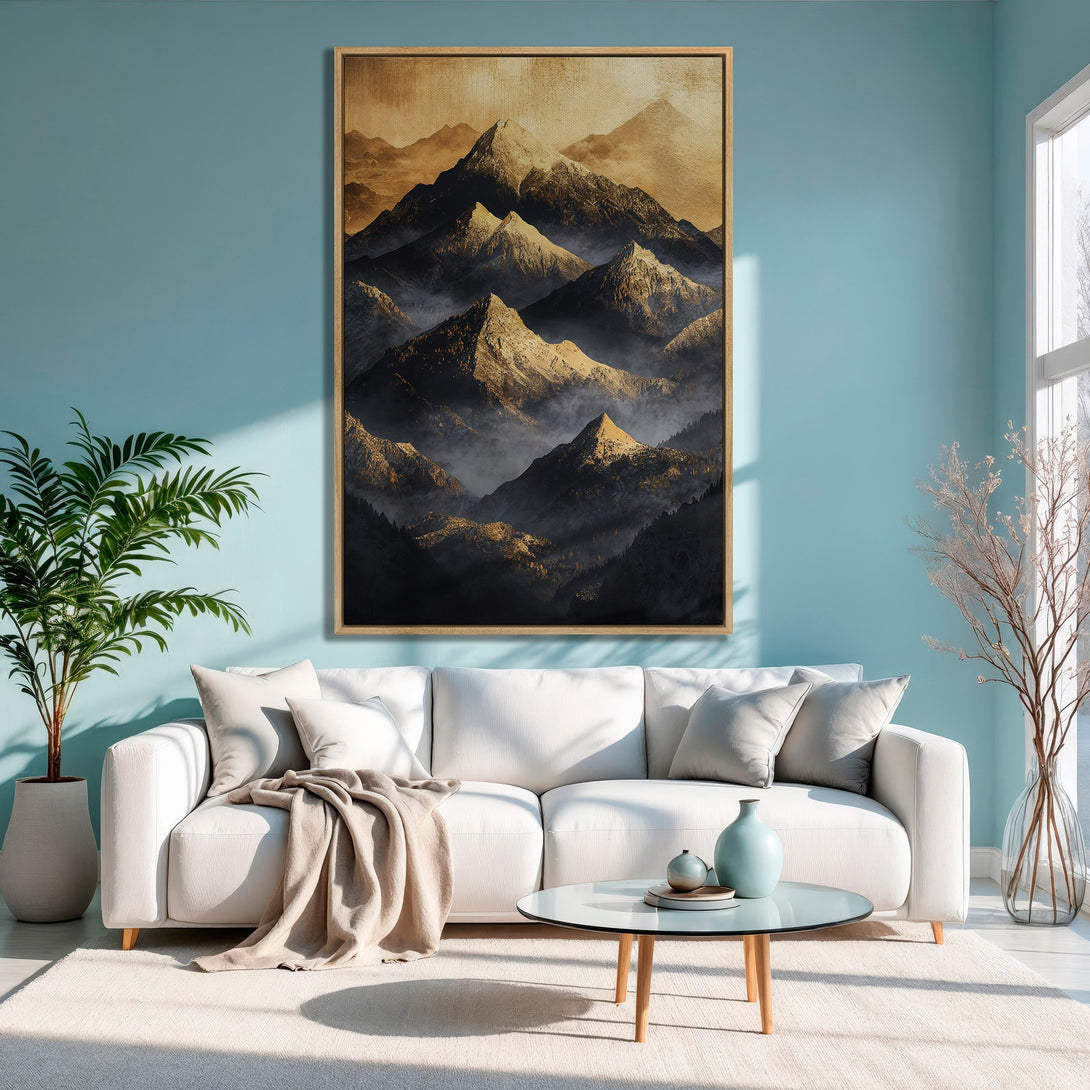 Framed Wall Art: Majestic mountain landscape in warm gold and black tones. Modern home decor with a serene, natural aesthetic.